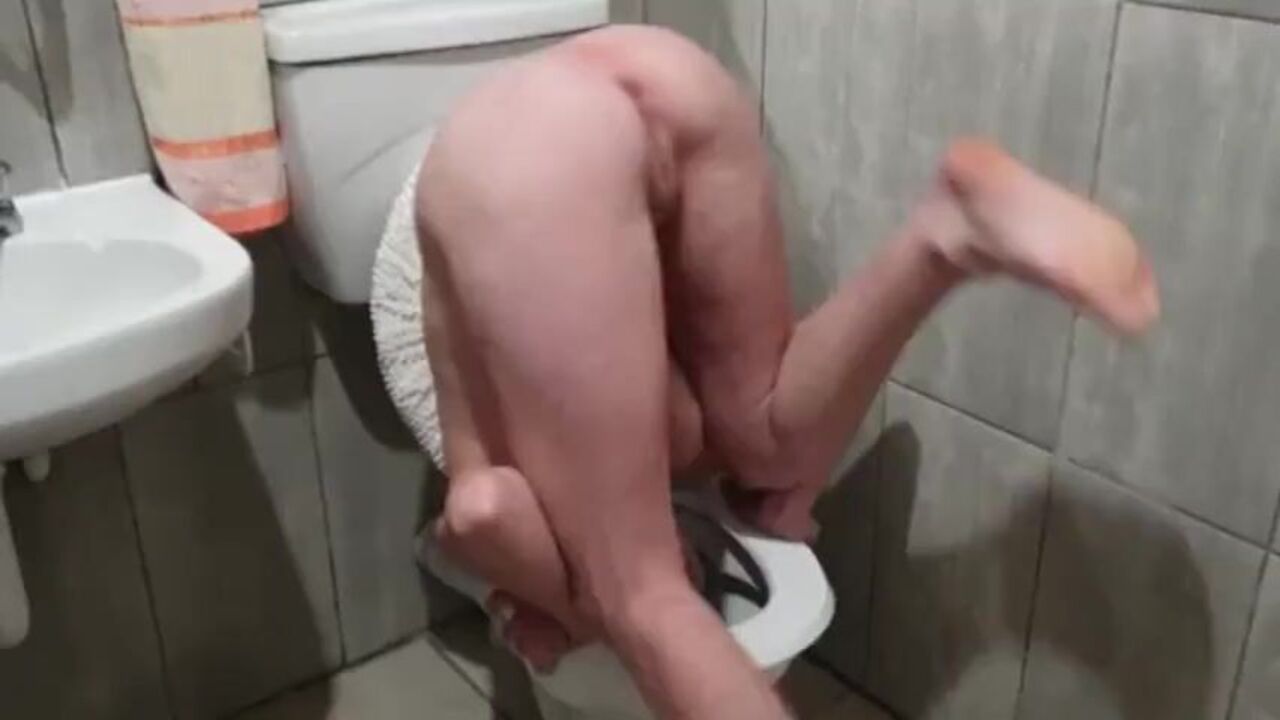 Watch as human toilet slut humiliates herself while pissing on her head in homemade video