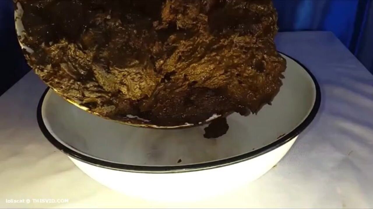 Thick stuff drips down the side of this slutty chick's face