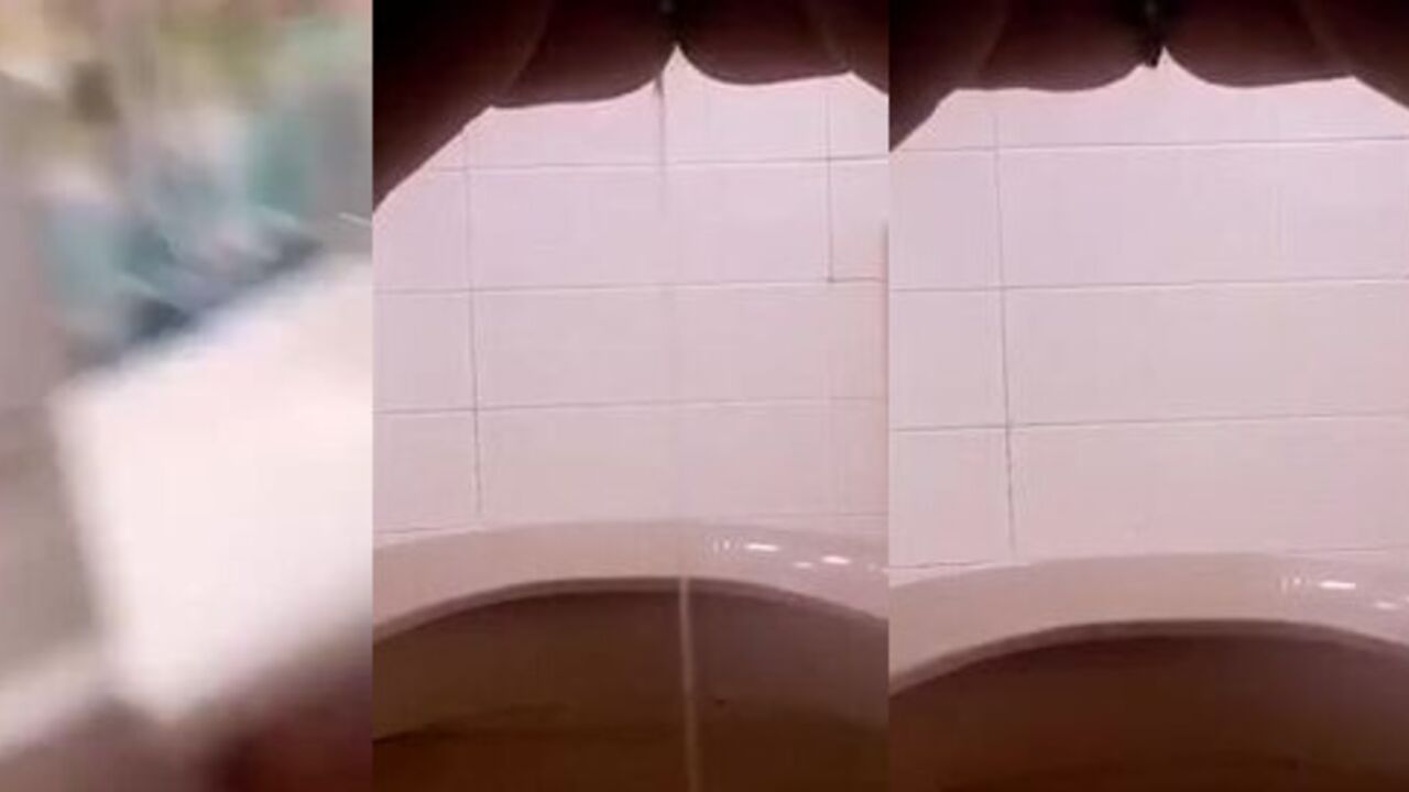 Indian chick with dark skin gets her pussy and scat wet with pee and shitting