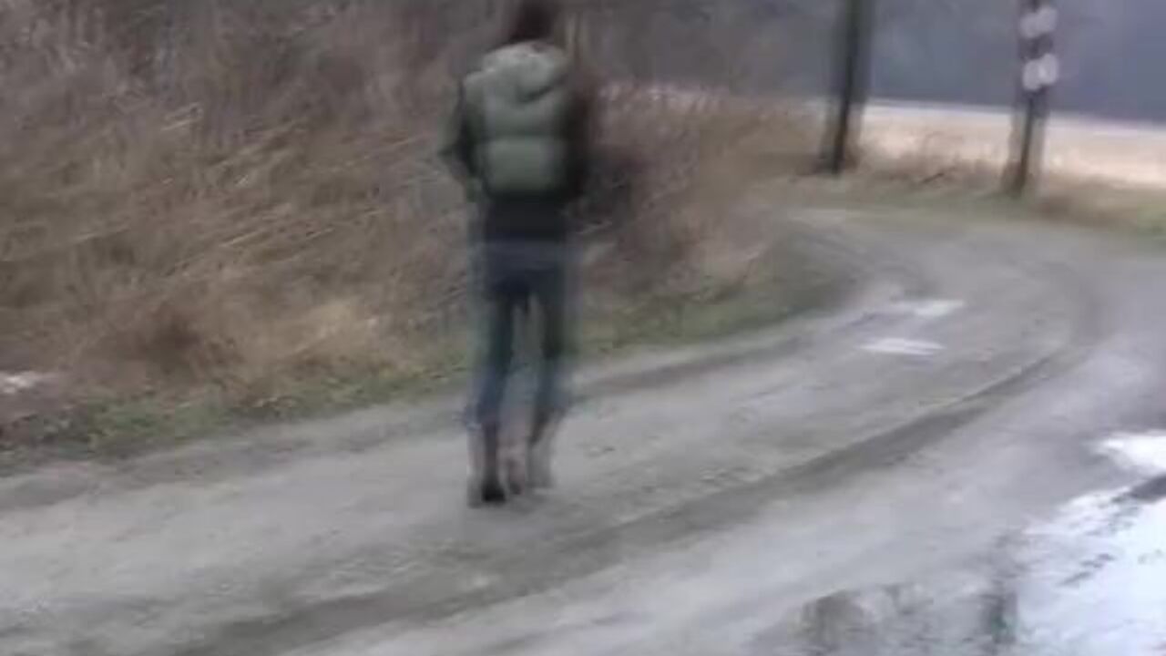 Watch this filthy girl piss and scat on a stone wall while playing with herself