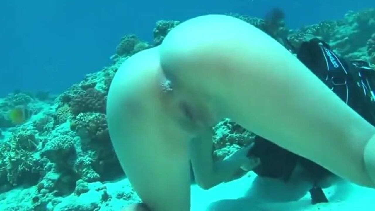 Watch this kinky slut scat in the ocean while getting her holes drilled hard