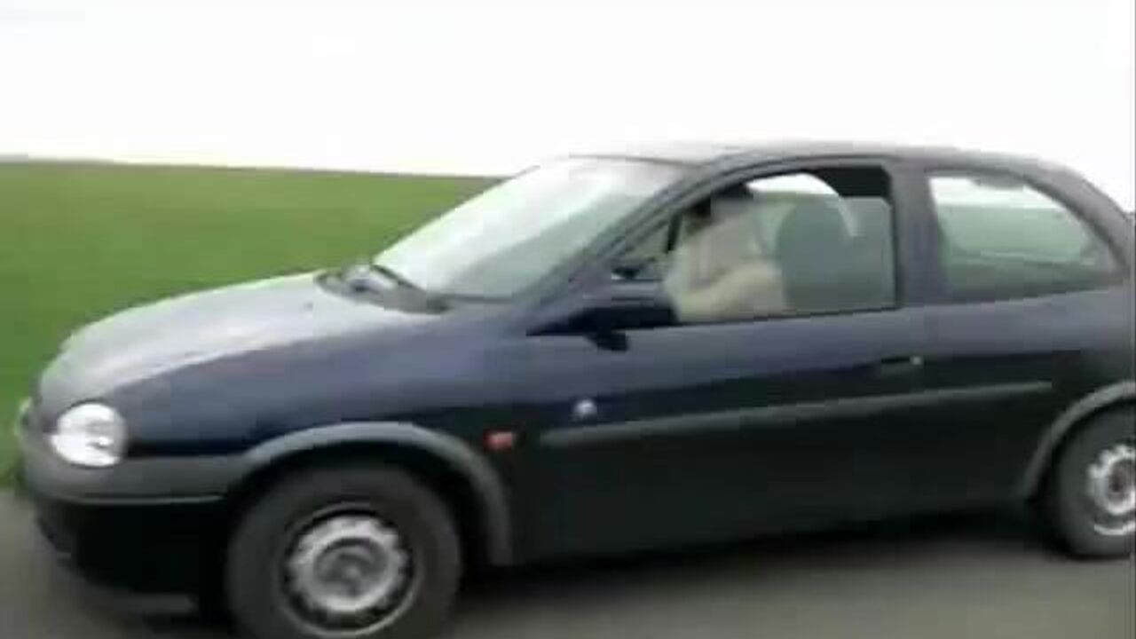 Watch this dirty girl pee and scat near the black car while getting off