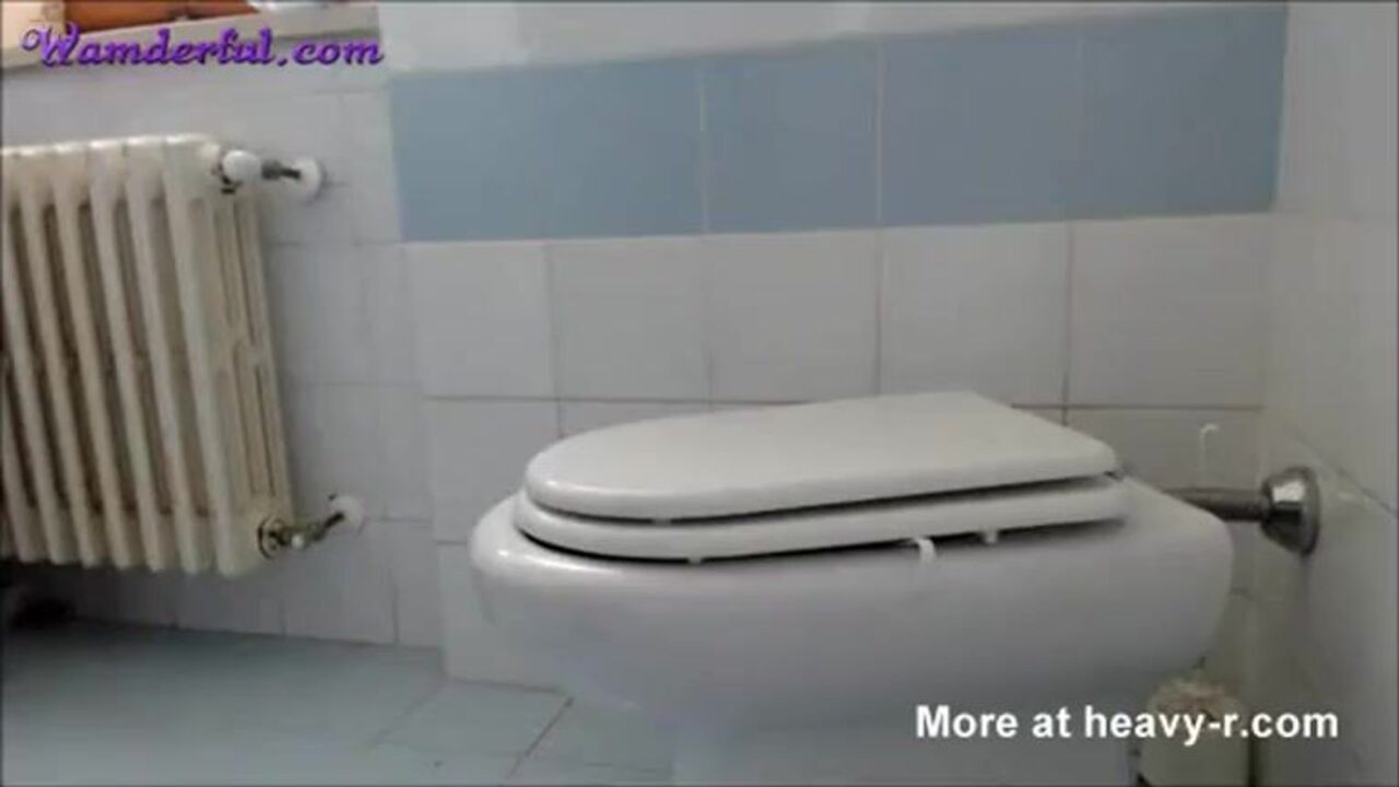 Watch this filthy slut get her face splattered with scat and her pussy drenched in it