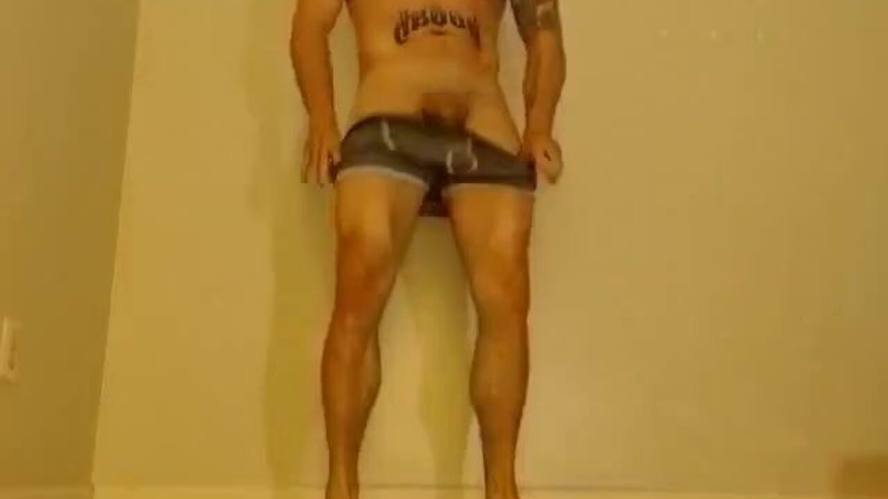 Watch this muscular dude moan while he shits and pisses in a hot, steamy scene