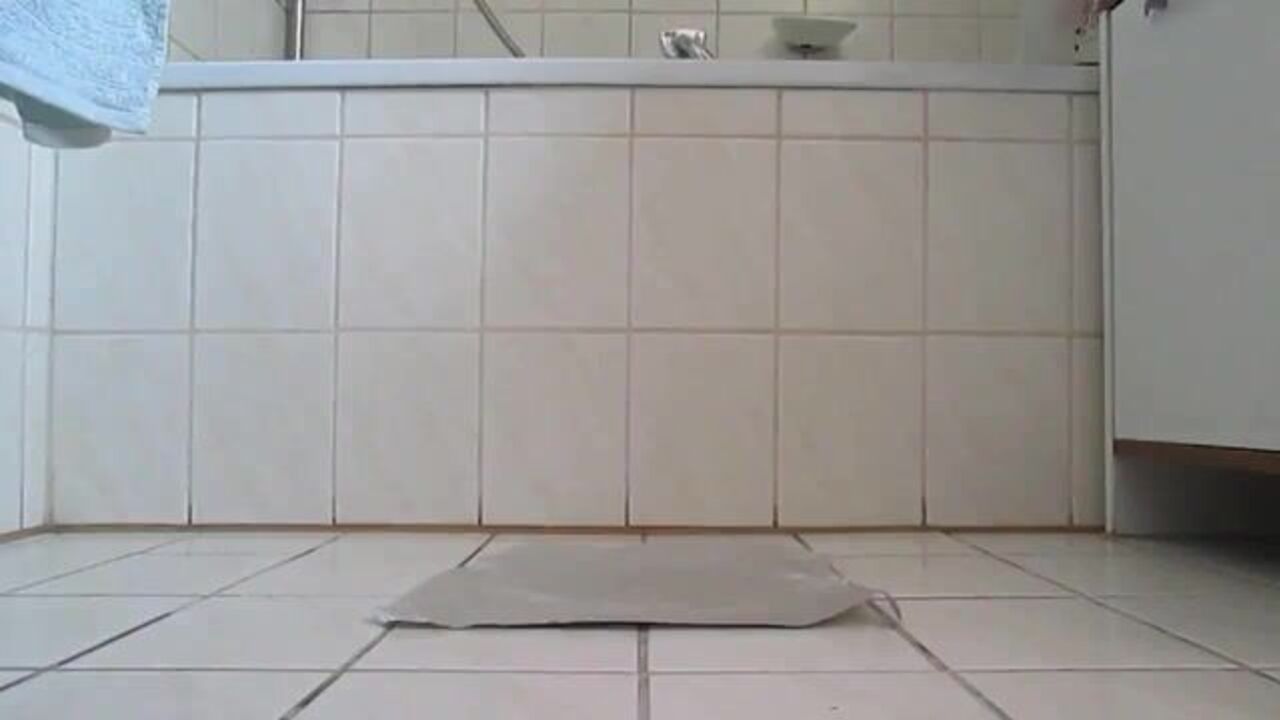 Watch this scat porn video of a big poop on the bathroom floor