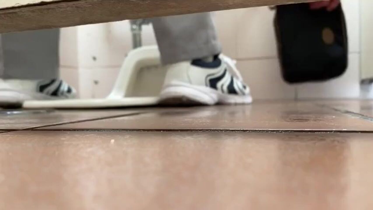 Voyeur dudes watch as scat drips out of a man's squat toilet
