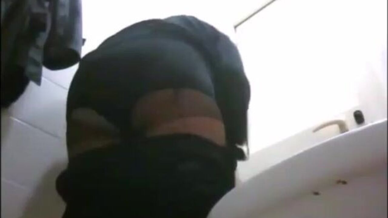 Watch this filthy mature woman get her scat wet and wild in public toilet