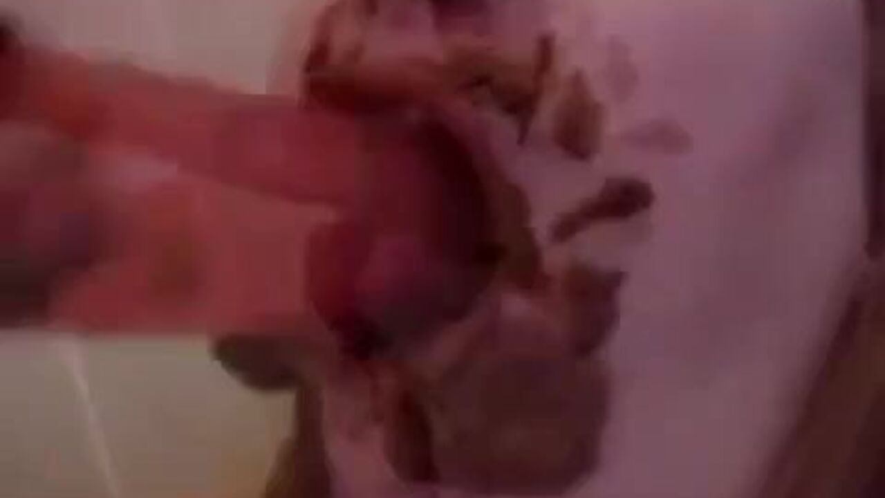 Watch this messy scat porn video of a dirty girl getting off with a dildo and a pussyful of warm spit