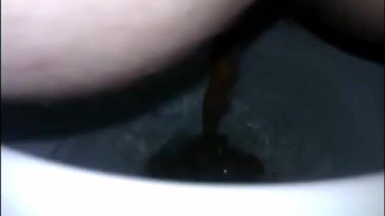 Get up close and personal with this toilet fetish video of a girl shitting in her own scat