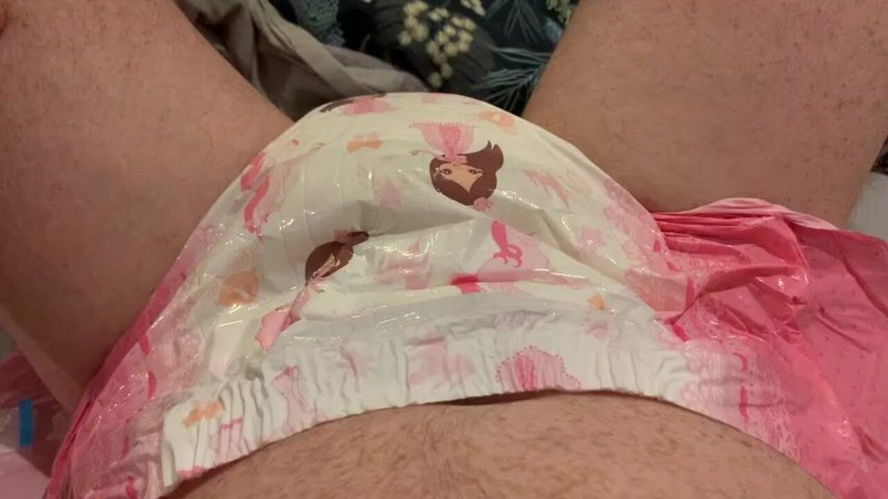 Watch as this diaper-clad babe gets a wake-up call from a dirty nappies