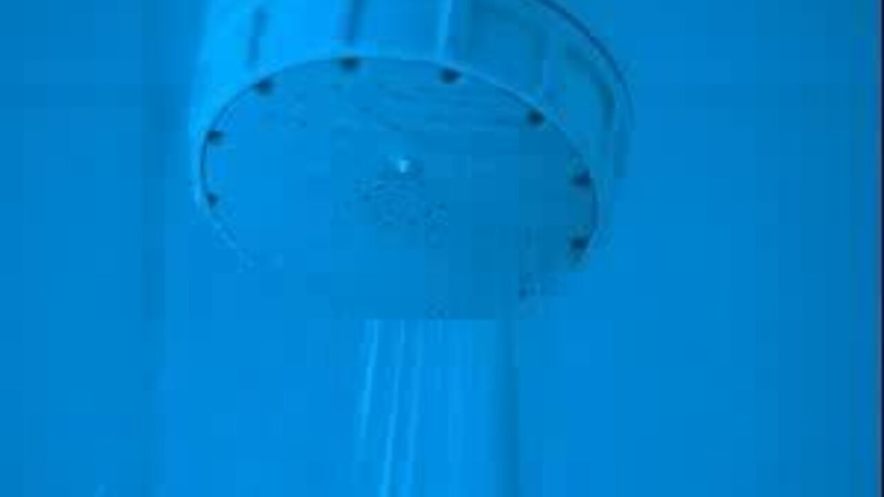 Lucy gets a steamy shower in this scat porn video