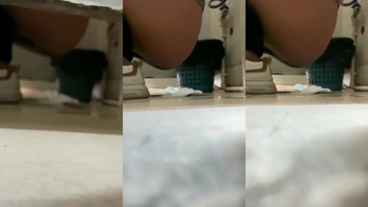 Watch this hot dude squat & pee on himself in a hot toilet video