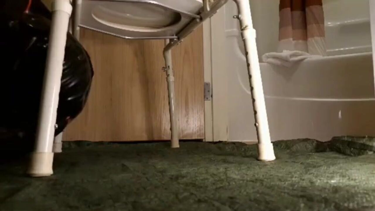 Watch this kinky babe devour latex-clad excretions like a champ