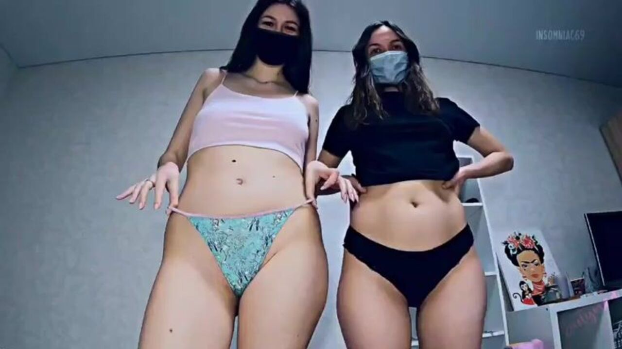 Watch these two masked girls get their scat pussies stuffed with porn