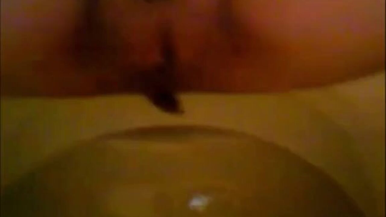 Watch this filthy girl insert a dildo up her tight asshole and make her scat puke