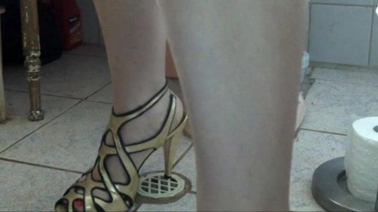 Watch this kinky slut get her golden feet worshipped and fucked hard