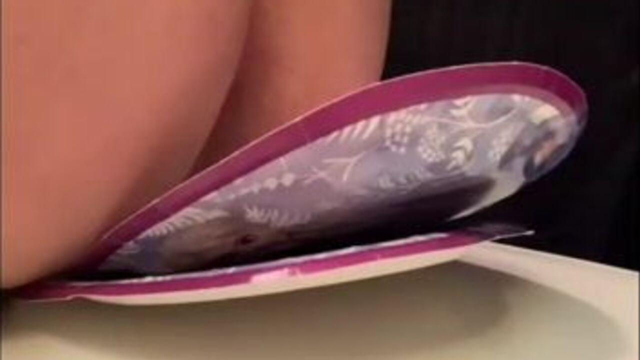 Watch this filthy scat video with a scatty slut and her slave, featuring some serious shitting and scatting action!