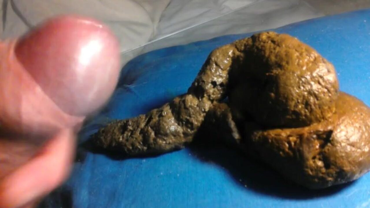 Watch as this babe covers fresh scat with her own jizz