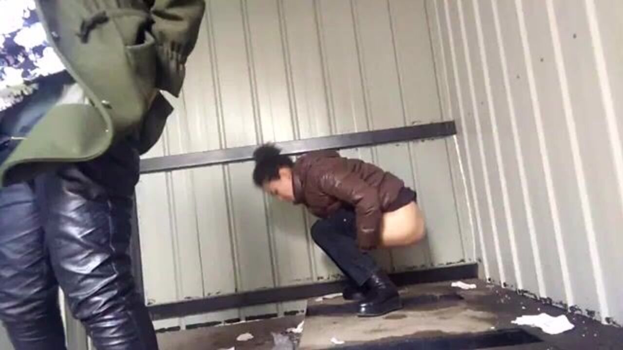 Watch this kinky Asian slut defecate in public toilet like a wild animal