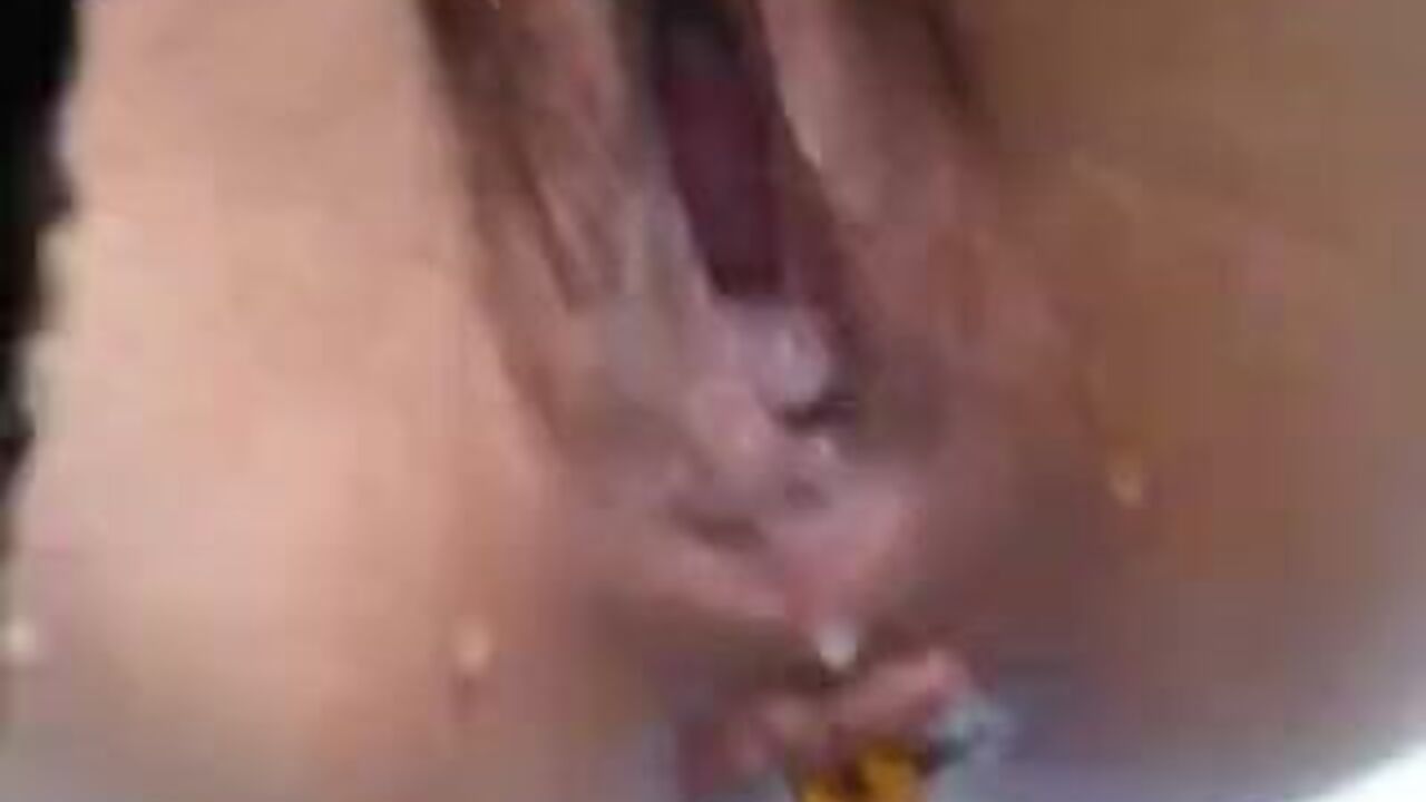 Watch this filthy slut get her ass stuffed with cum while she shits like a pig