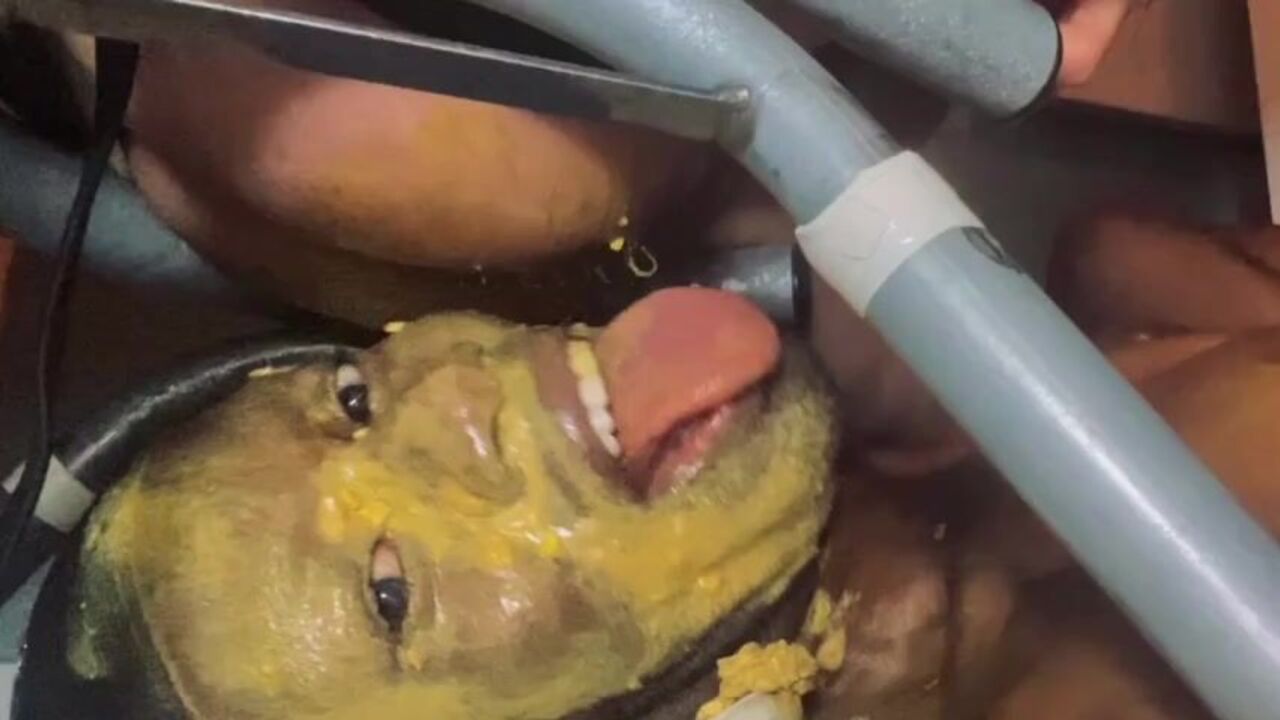 Watch this kinky black filth devouring his own filth while feeding it to him