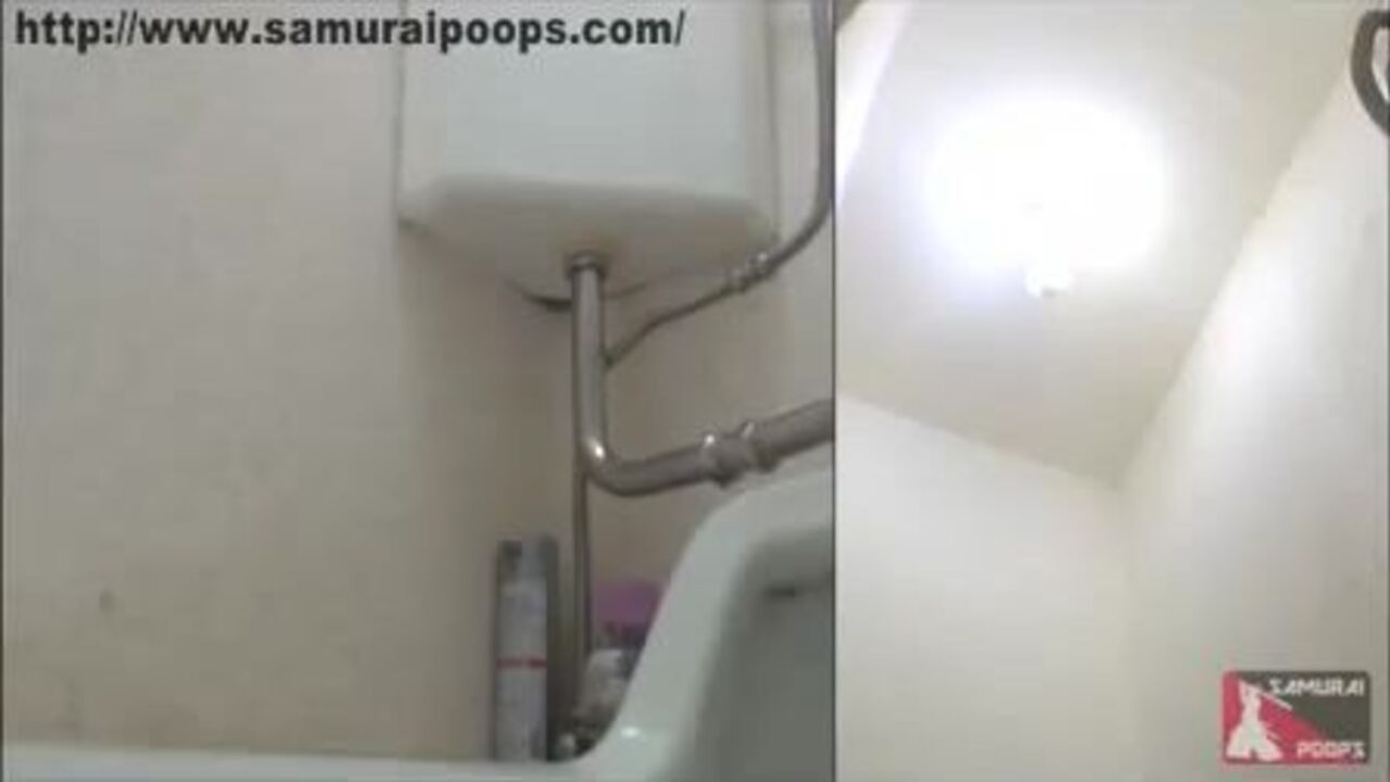 Japanese slut gets off in public toilet with her juicy scat