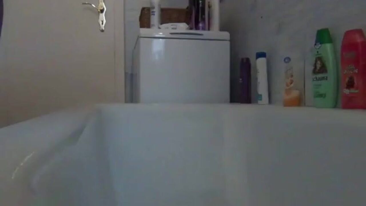 Watch this chubby babe get her pussy scalded and drenched in her own pee