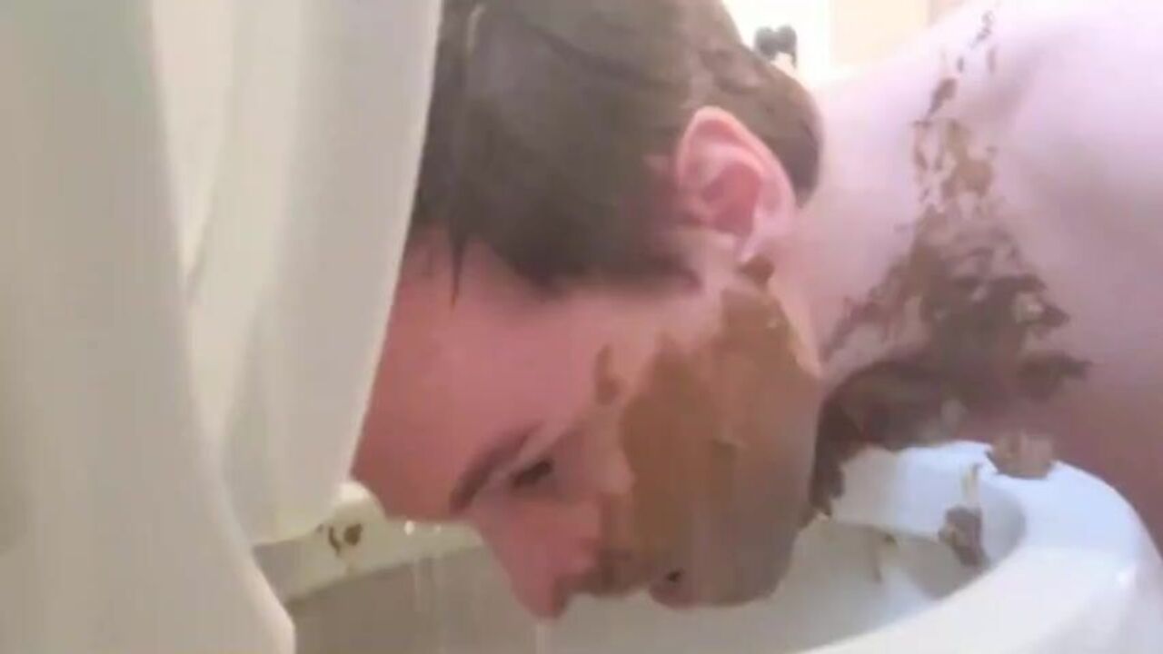 Watch this submissive human toilet slave get down and dirty with a massive pile of human excrement