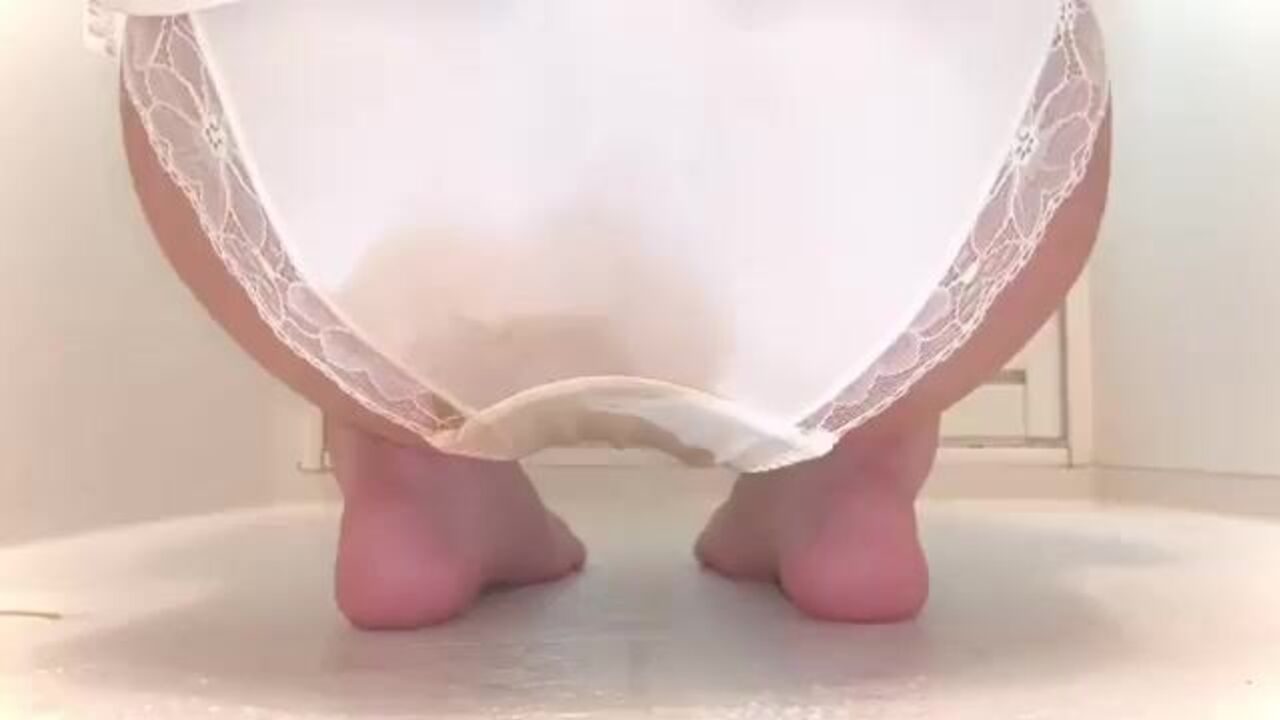 Watch this scat porn video of a dirty girl in white panties getting a fart in her own ass