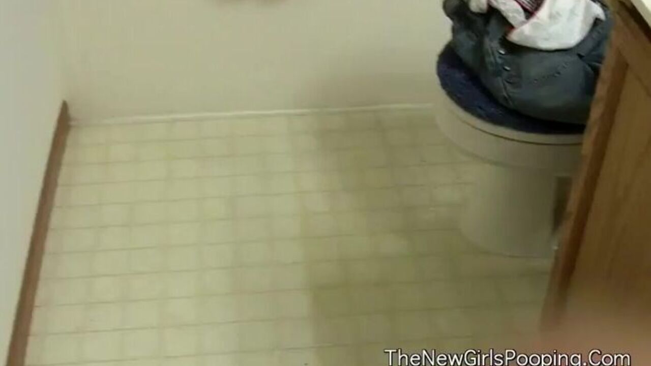 Brunette slave gets her pussy and ass pumped while pooping in scat video