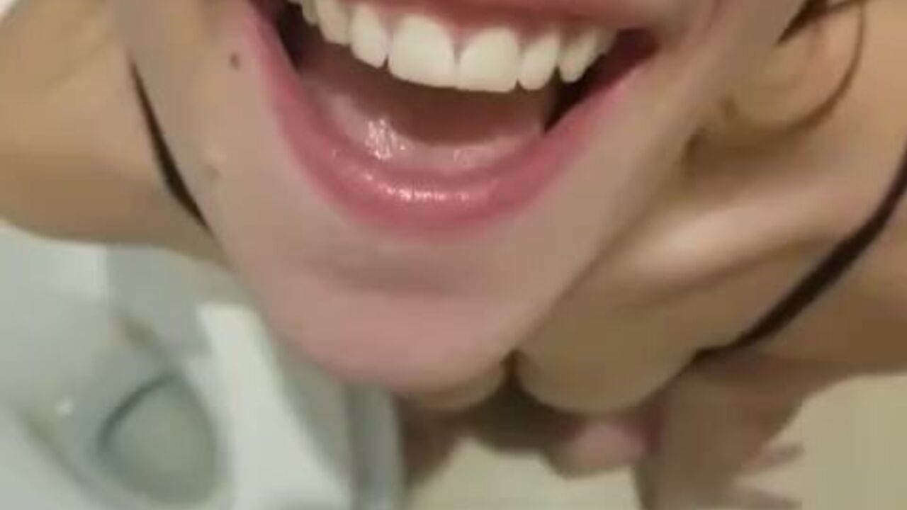 Kinky amateur slut gulps down warm pee while playing with her scat in the toilet