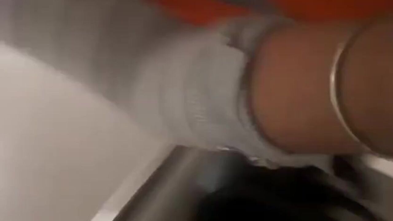 Tan woman with a fat ass gets off on peeing in the bathroom