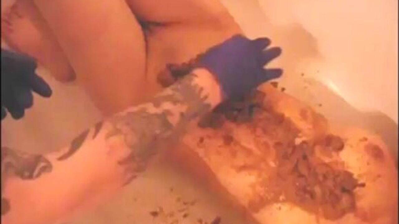 Kinky couple indulges in some scat play in the bathtub