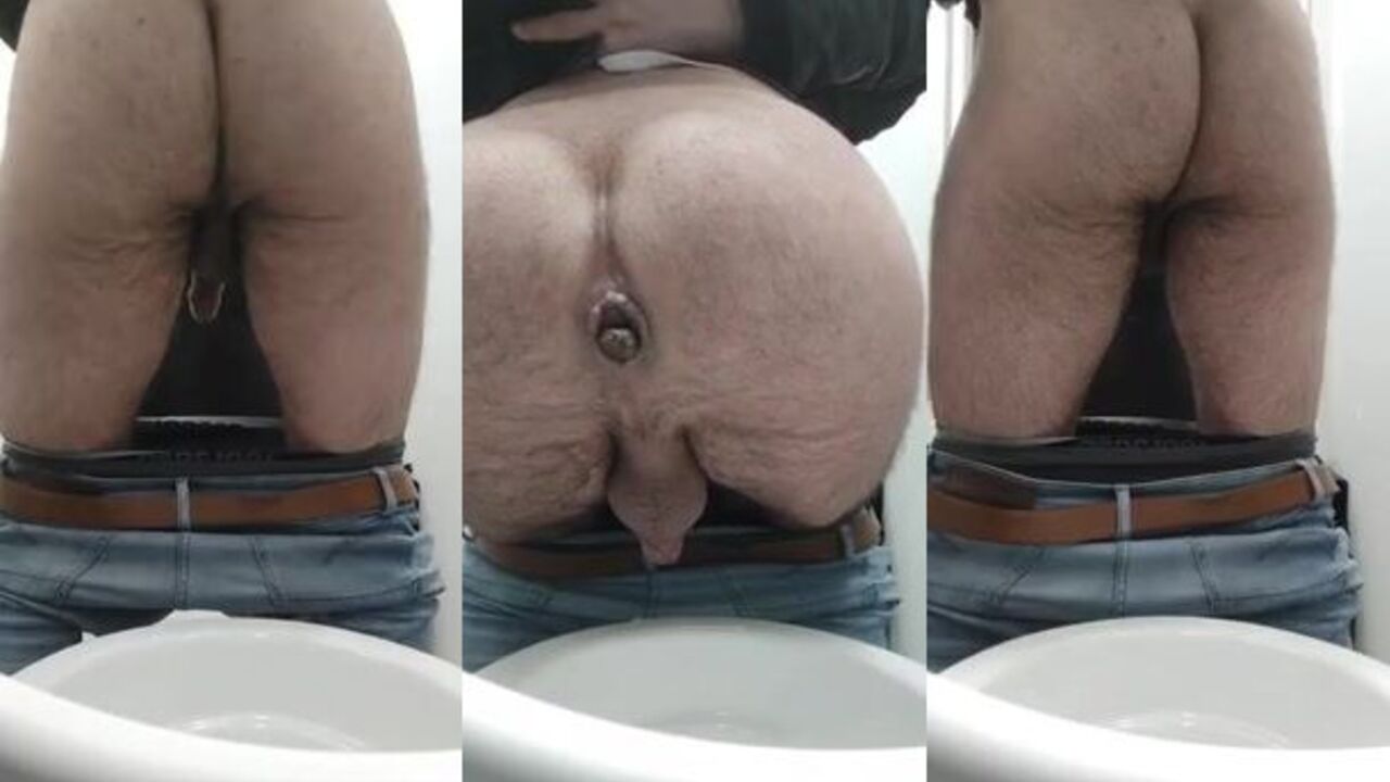 Spy Cam catches a guy peeing in a public toilet - caught on camera!