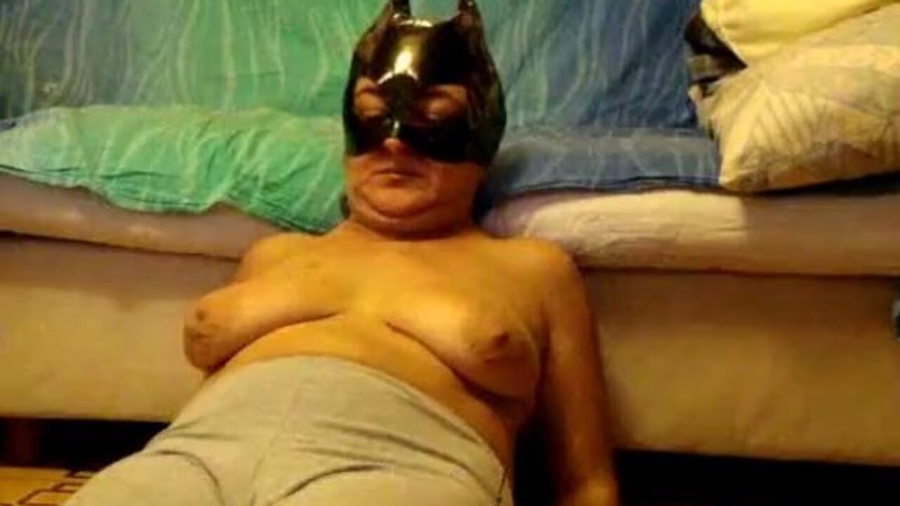 Mature Catwoman goes wild and swallows every last drop of her scat slave's load