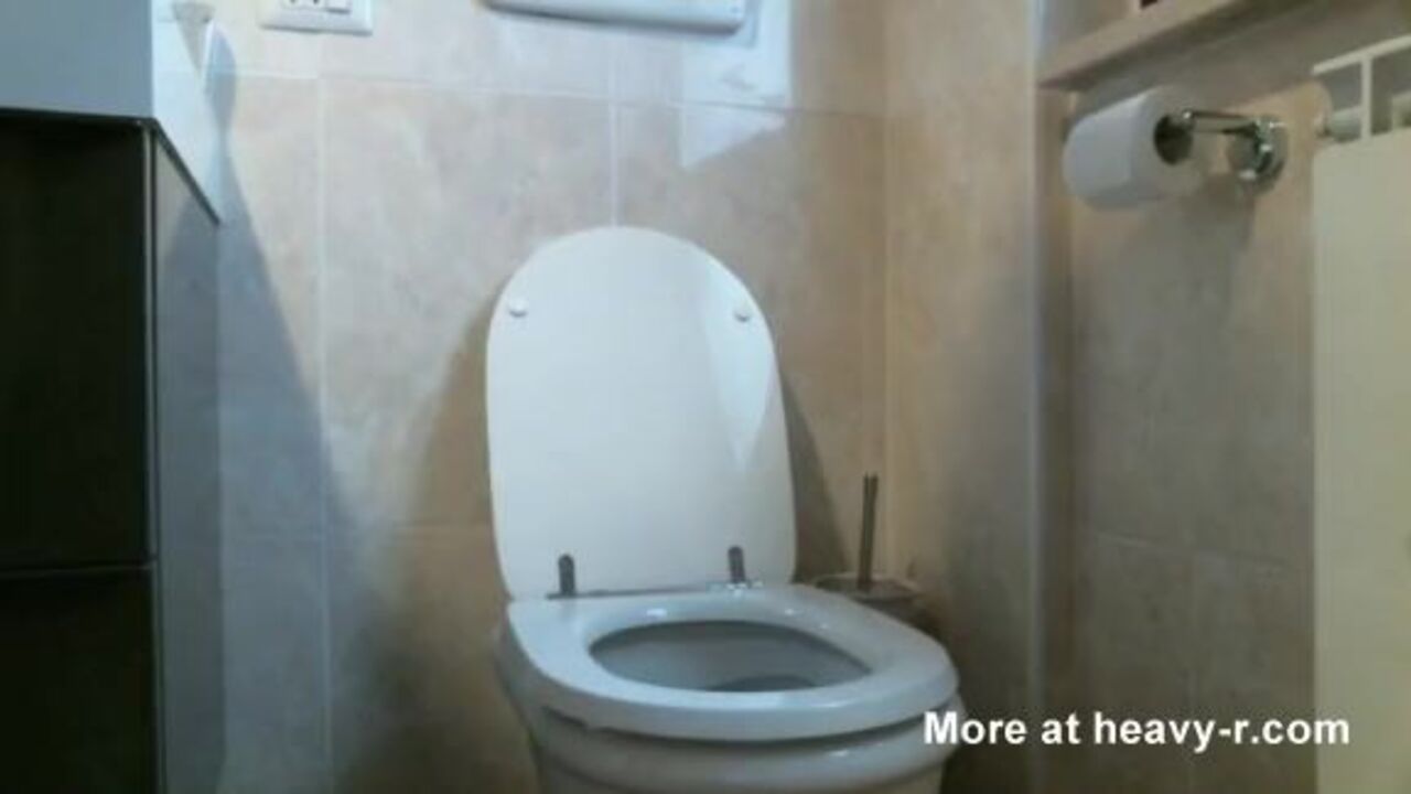 Hot girl gets off on scat porn & pissing antics